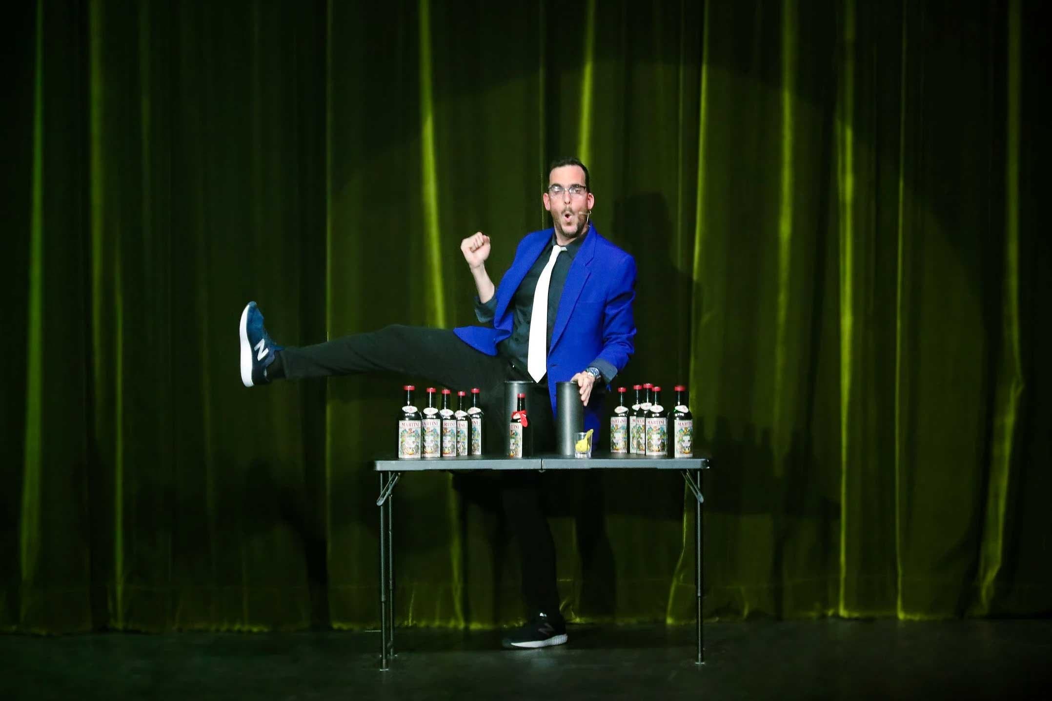 Comedy magician Daniel Giandoni performing